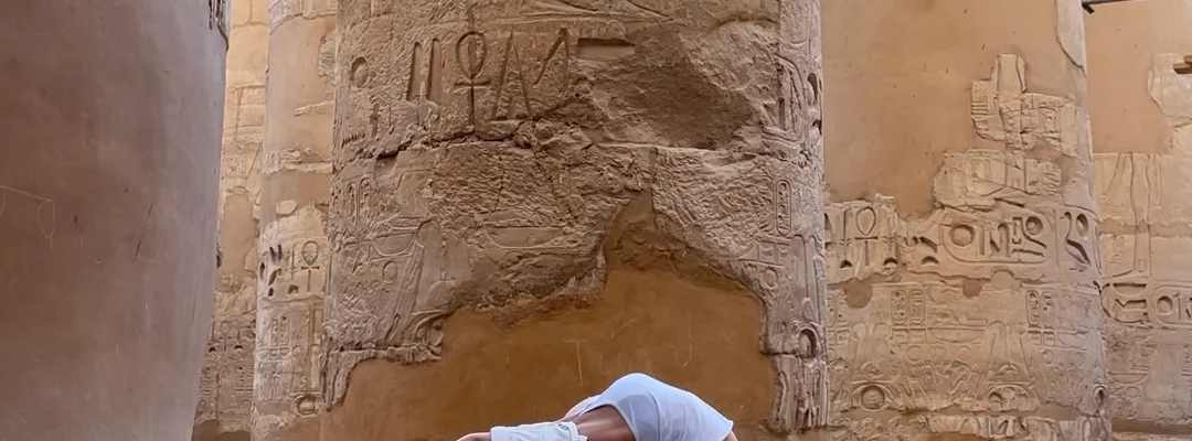Standing Backbend between the pillars of Karnak Temple