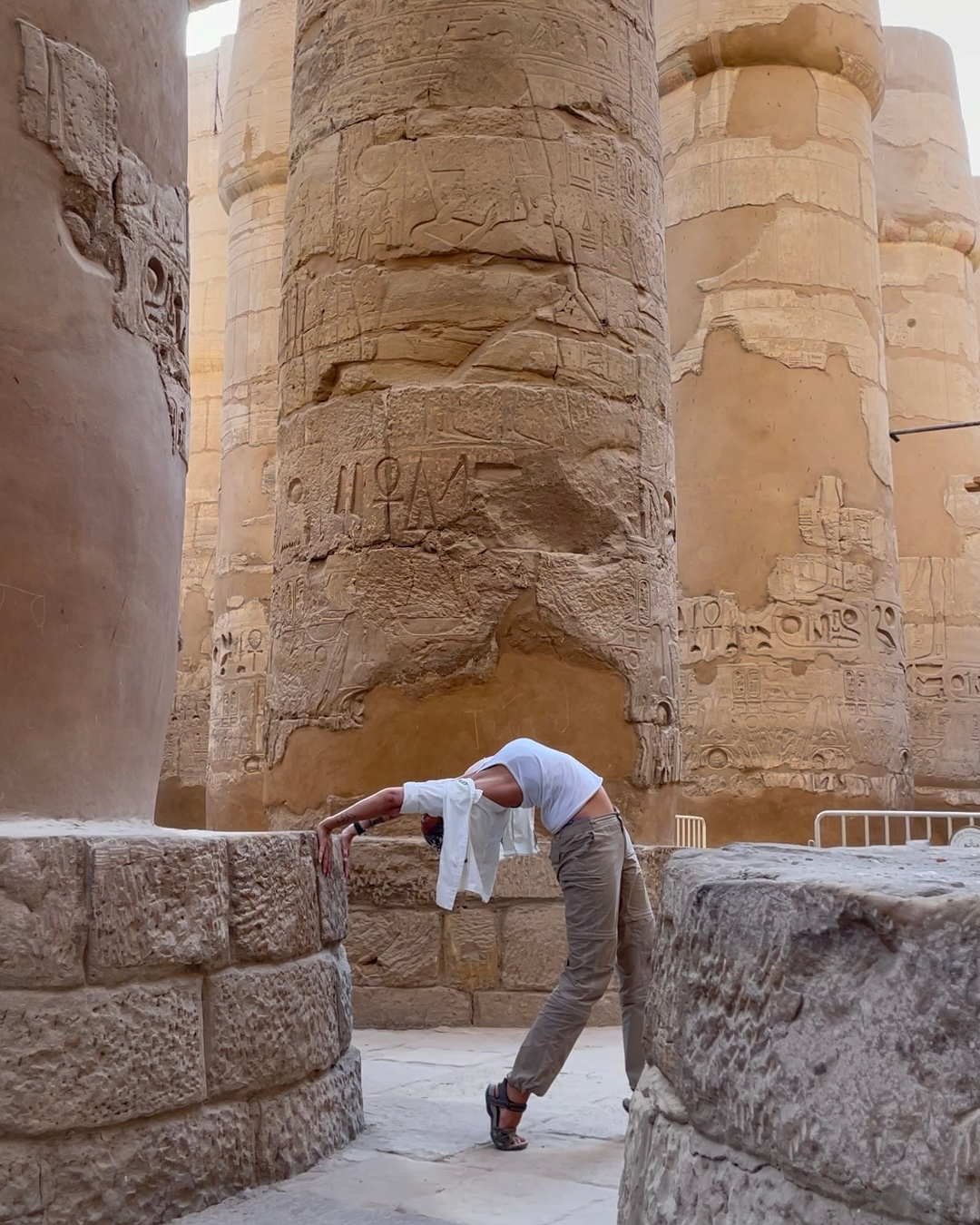 Standing Backbend between the pillars of Karnak Temple